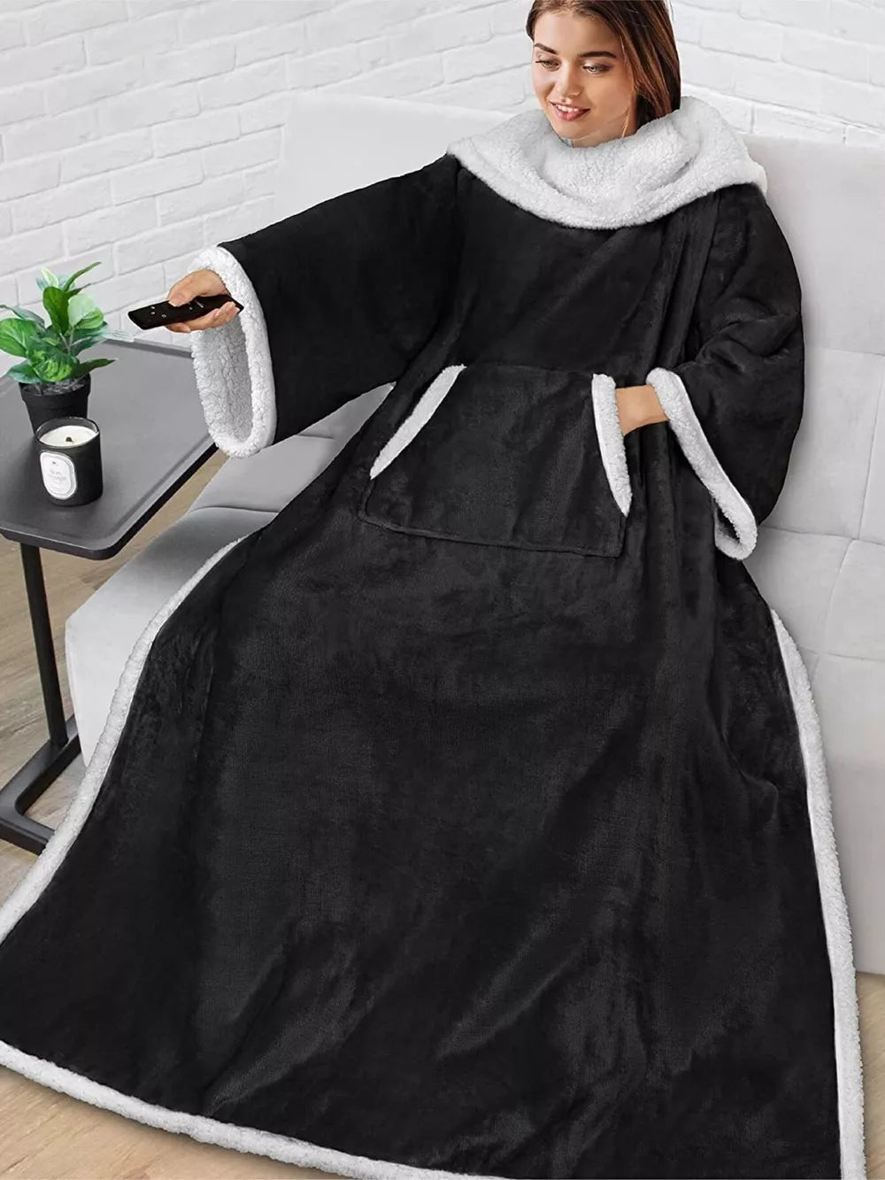 Black sherpa-trim wearable blanket — front view